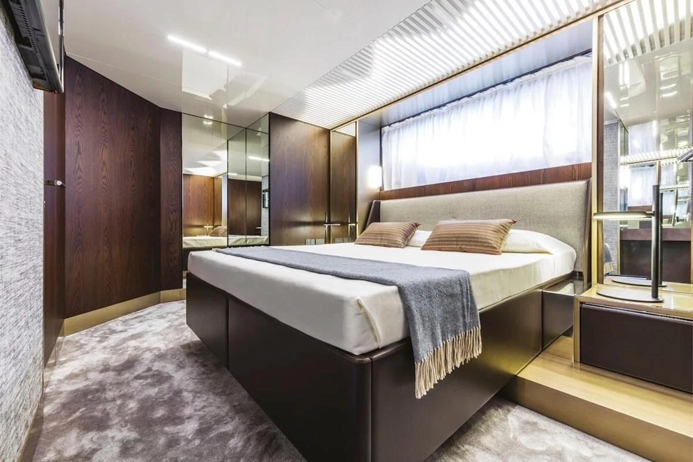a bedroom with a bed aboard KATARIINA XO Yacht for Sale