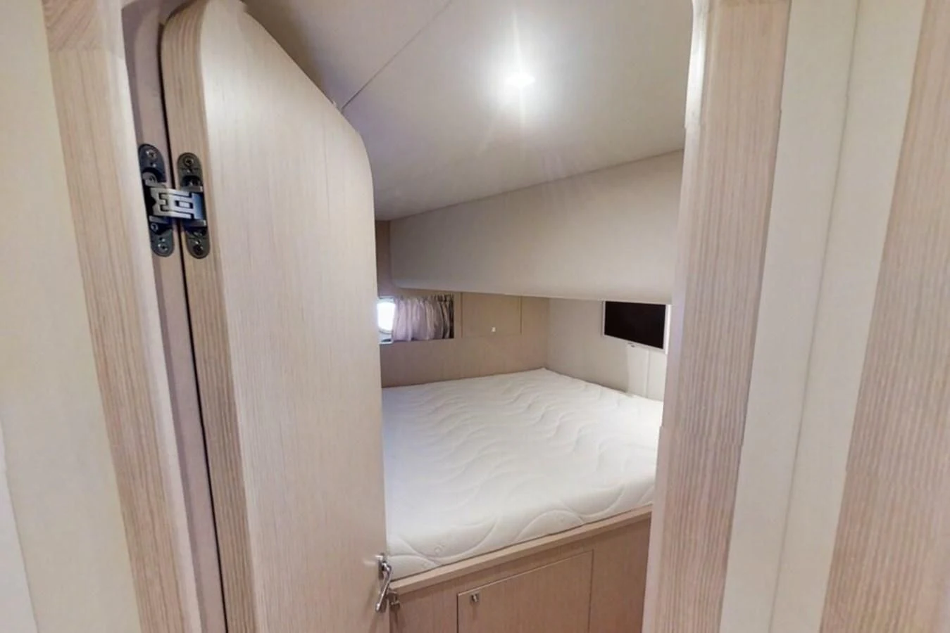 a door leading to a bed aboard KATARIINA XO Yacht for Sale