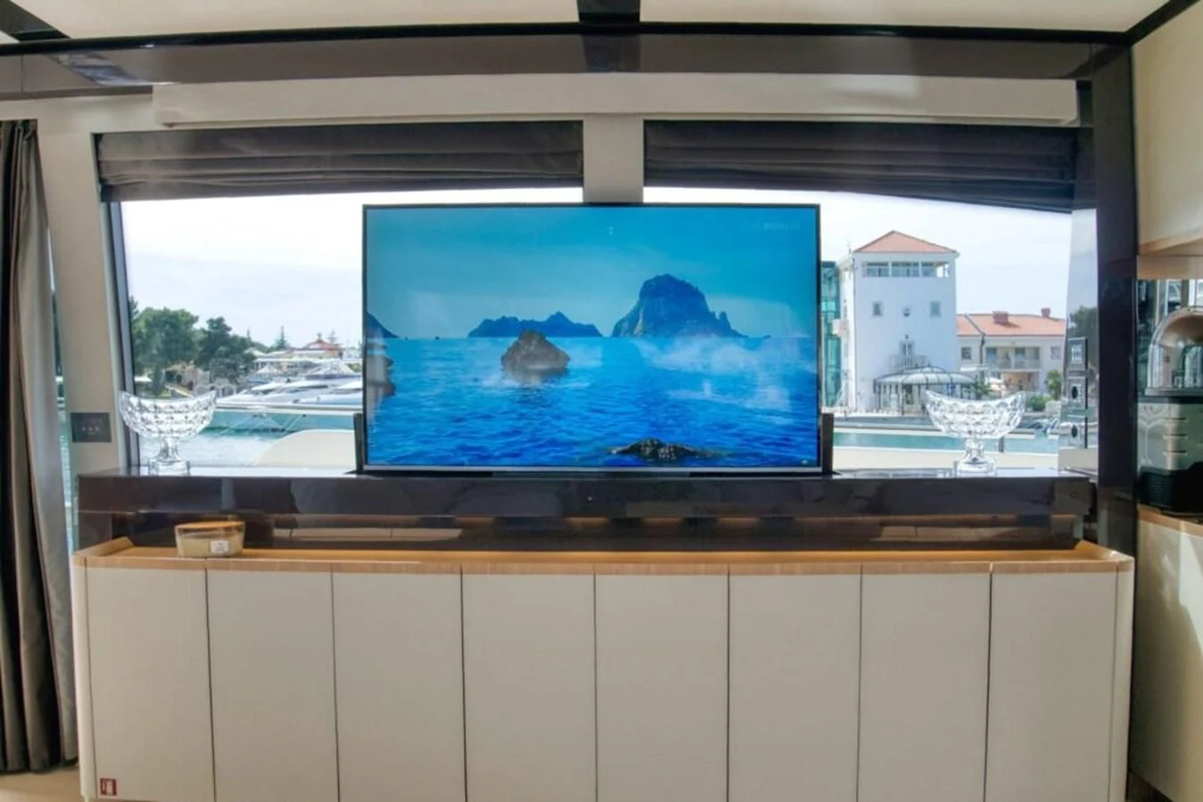 a large television screen aboard KATARIINA XO Yacht for Sale