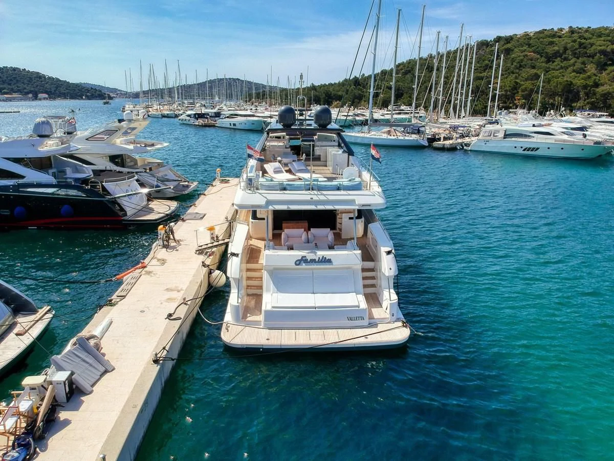 a boat docked at a pier aboard KATARIINA XO Yacht for Sale