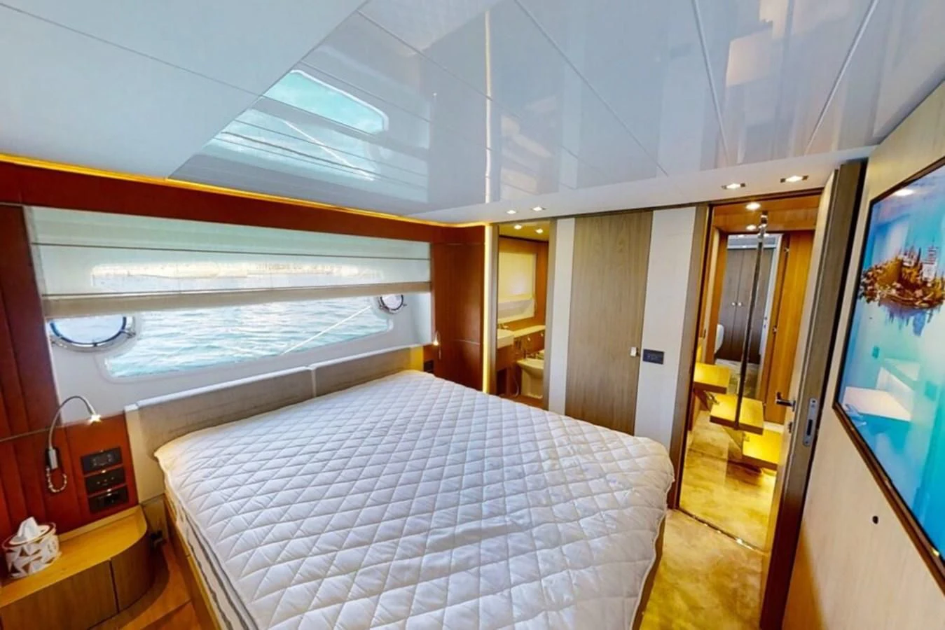 a bed in a room aboard KATARIINA XO Yacht for Sale