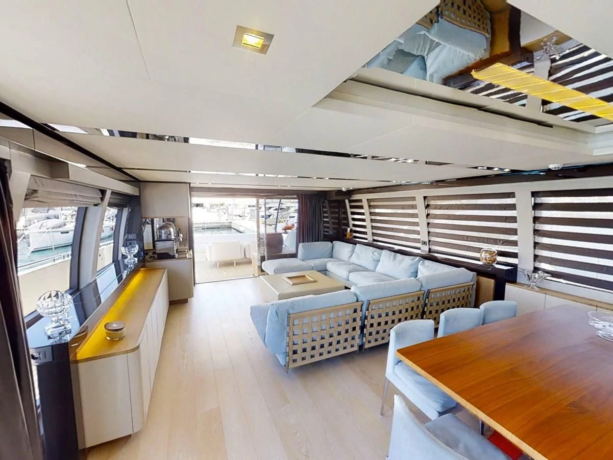 a room with a couch and a table aboard KATARIINA XO Yacht for Sale