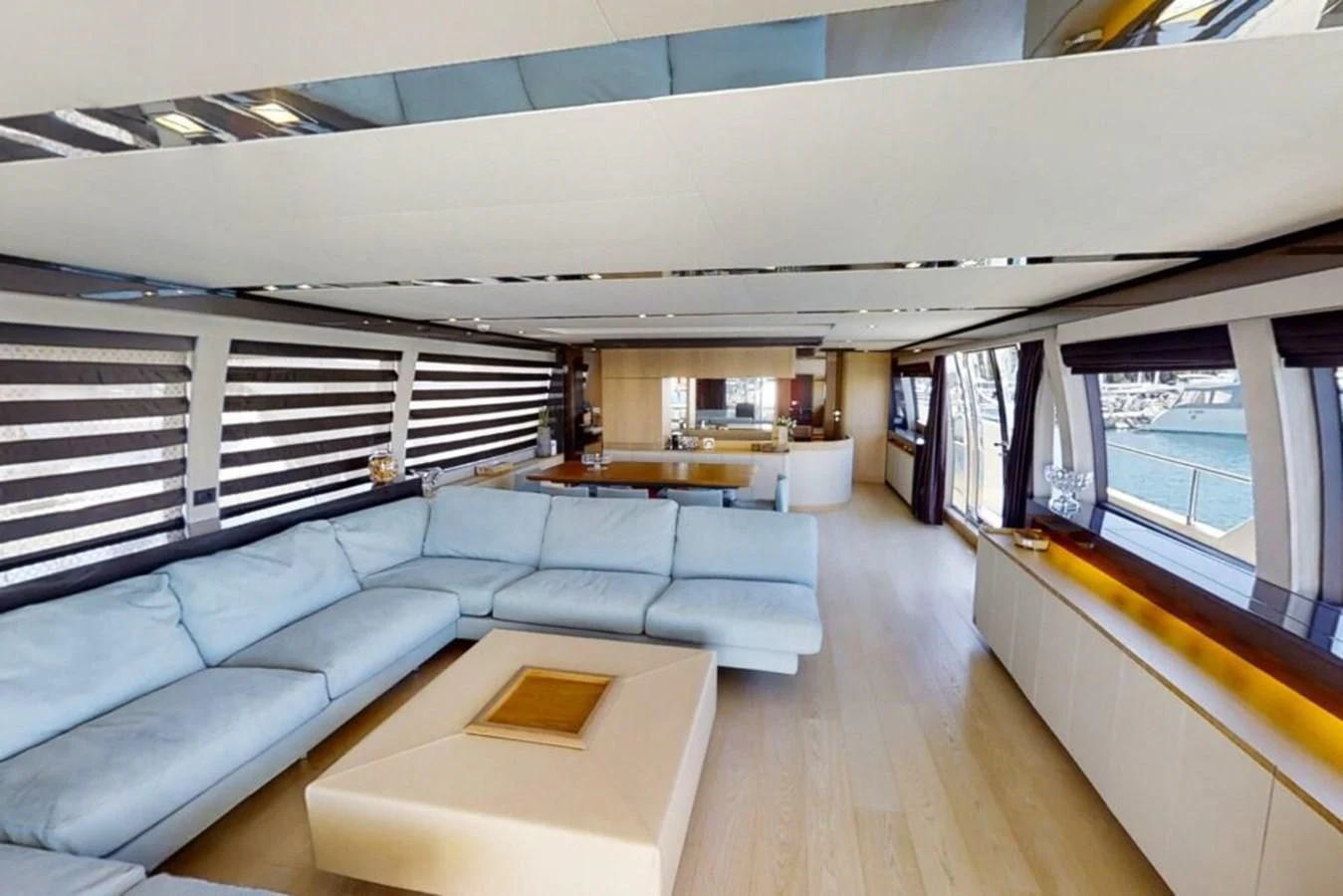 a room with a couch and a table aboard KATARIINA XO Yacht for Sale