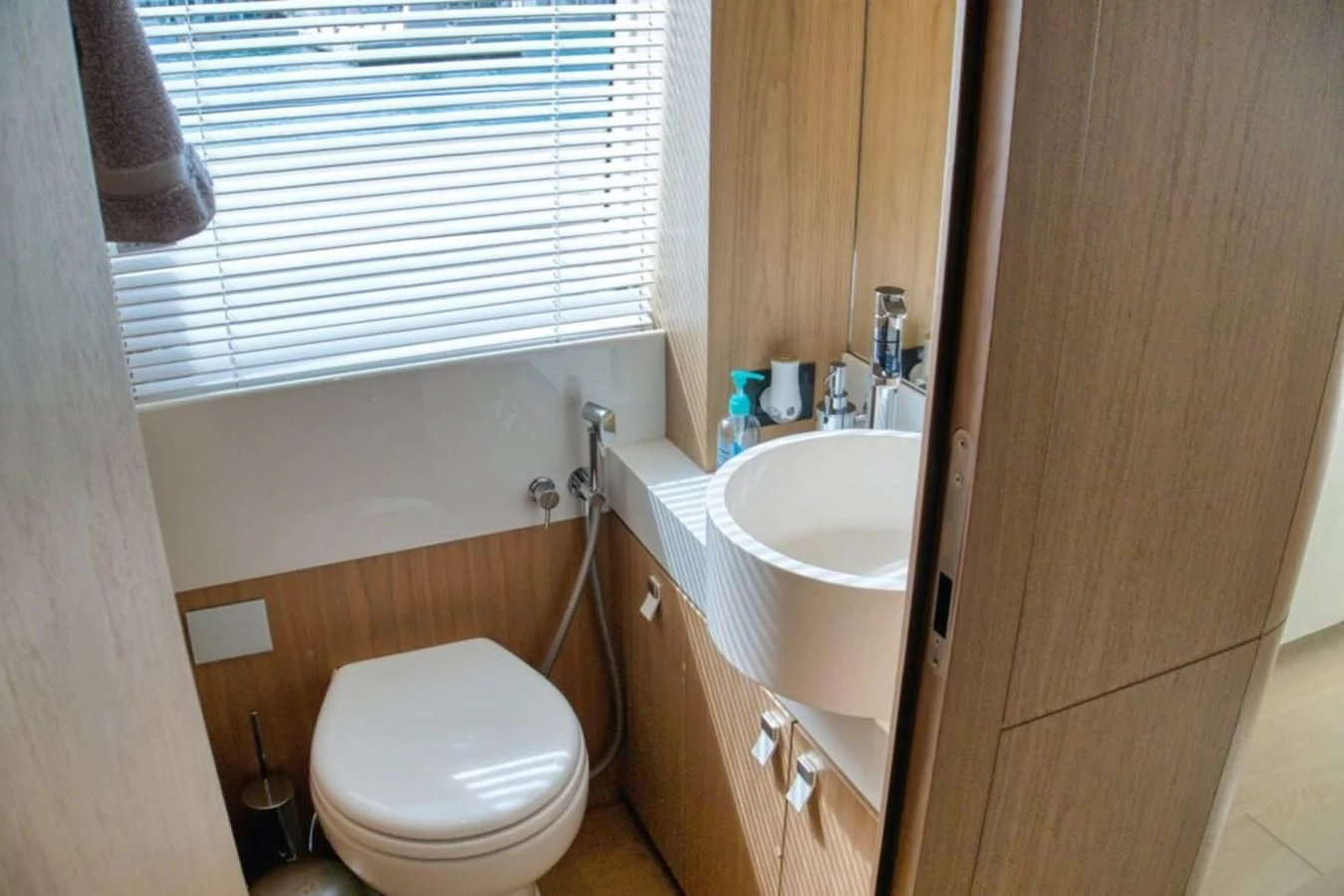 a bathroom with a sink and a toilet aboard KATARIINA XO Yacht for Sale