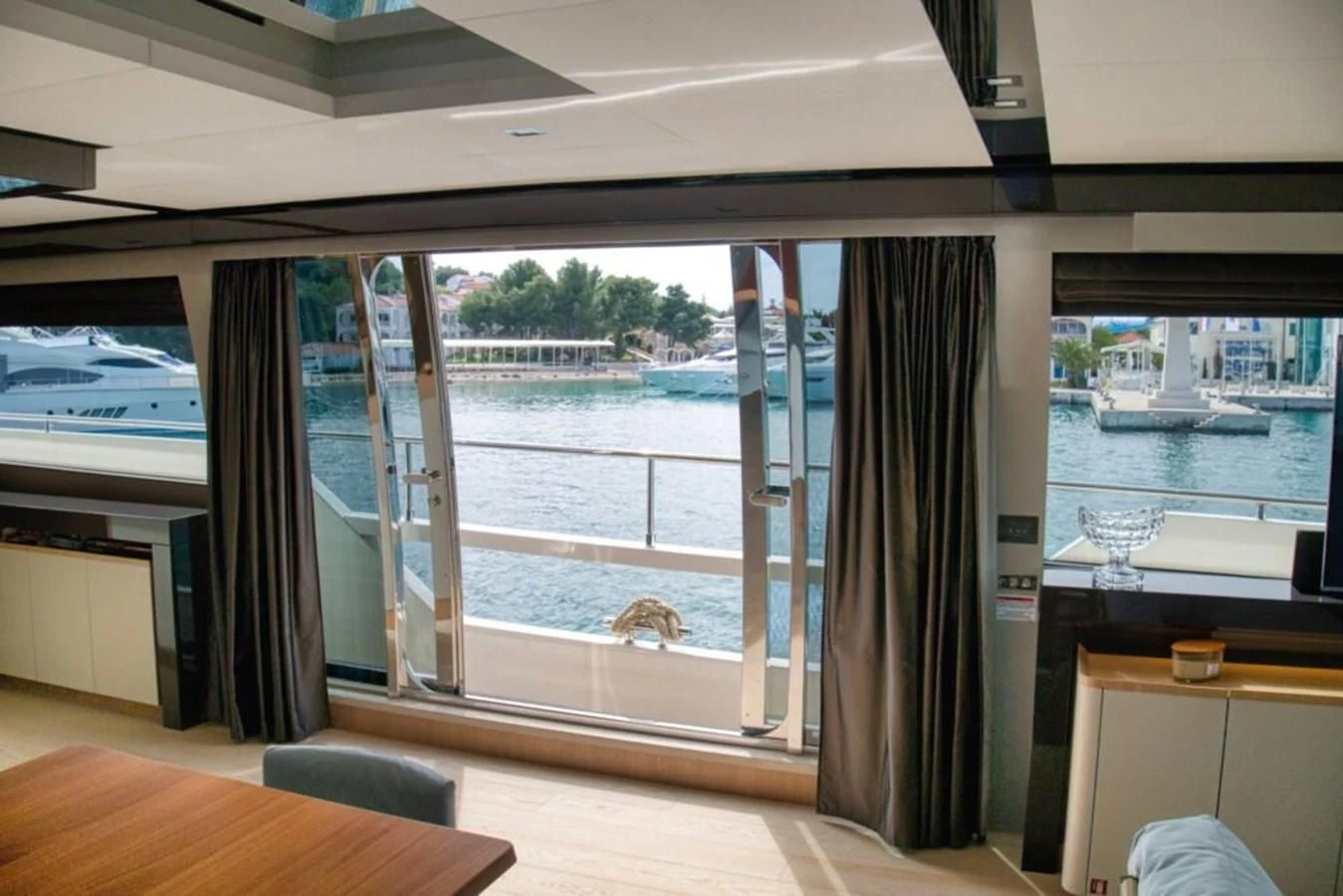 a room with a large window aboard KATARIINA XO Yacht for Sale