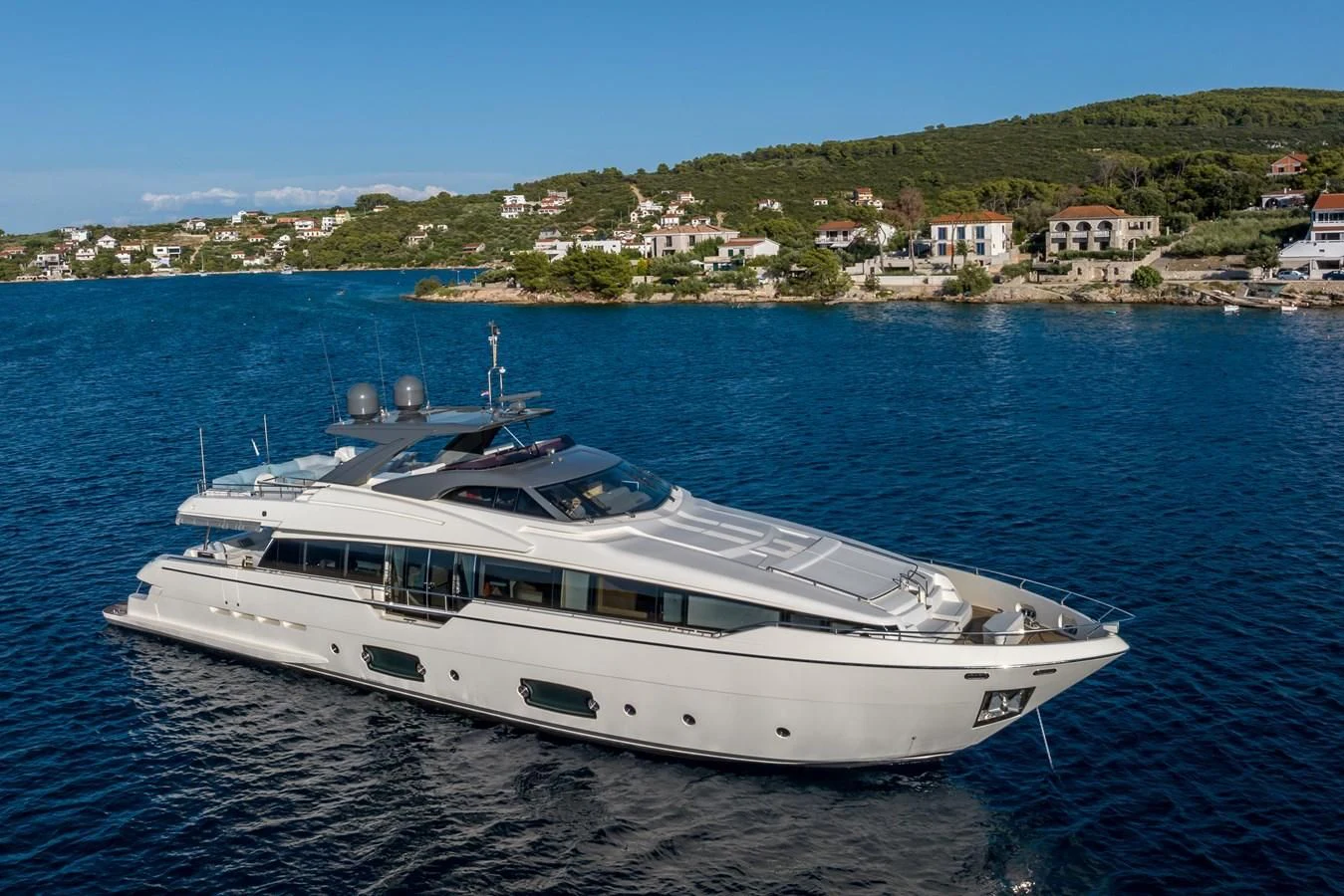 a white yacht on the water aboard KATARIINA XO Yacht for Sale