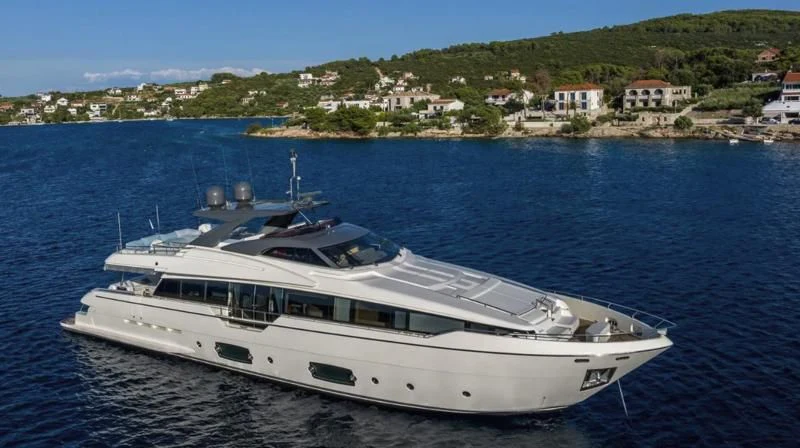 a white yacht on the water aboard KATARIINA XO Yacht for Sale