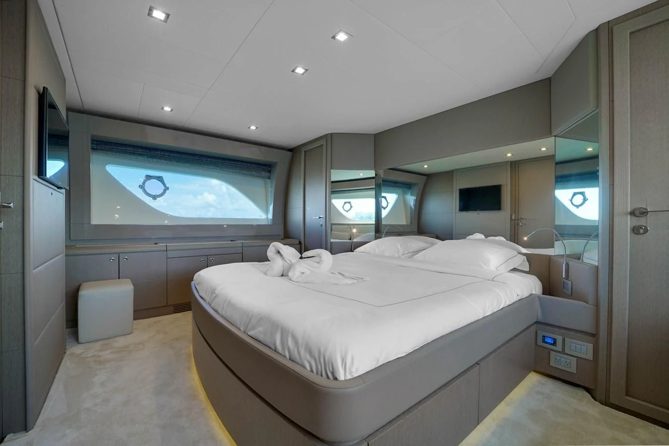 a room with a bed and a television aboard KATARIINA XO Yacht for Sale