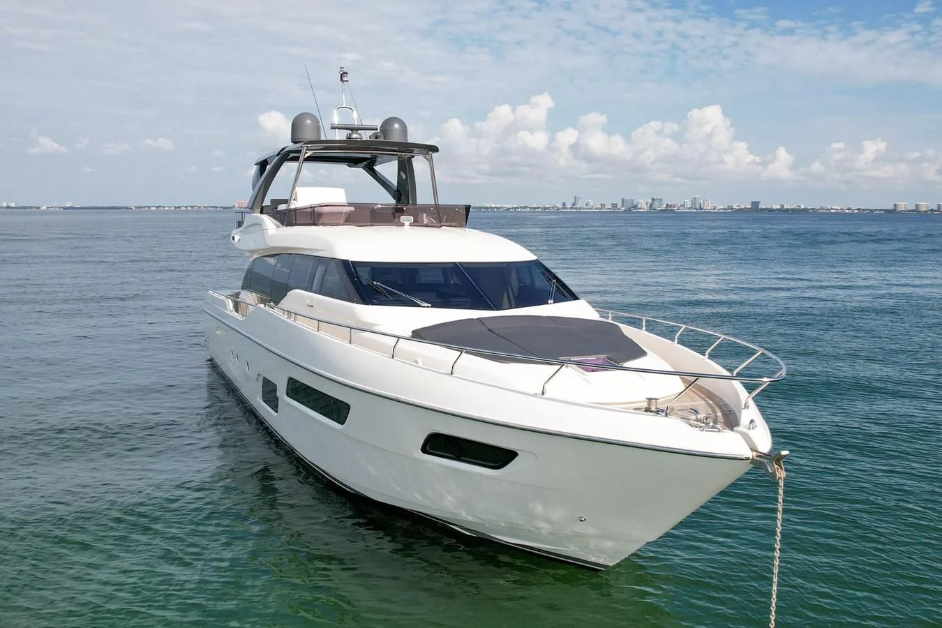a white yacht in the water aboard KATARIINA XO Yacht for Sale