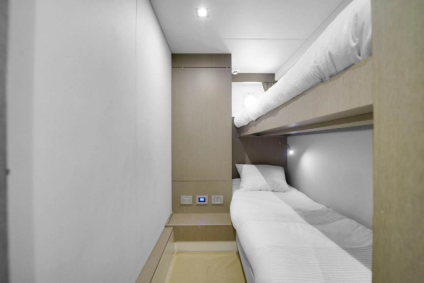 a room with a bed and a shelf aboard KATARIINA XO Yacht for Sale