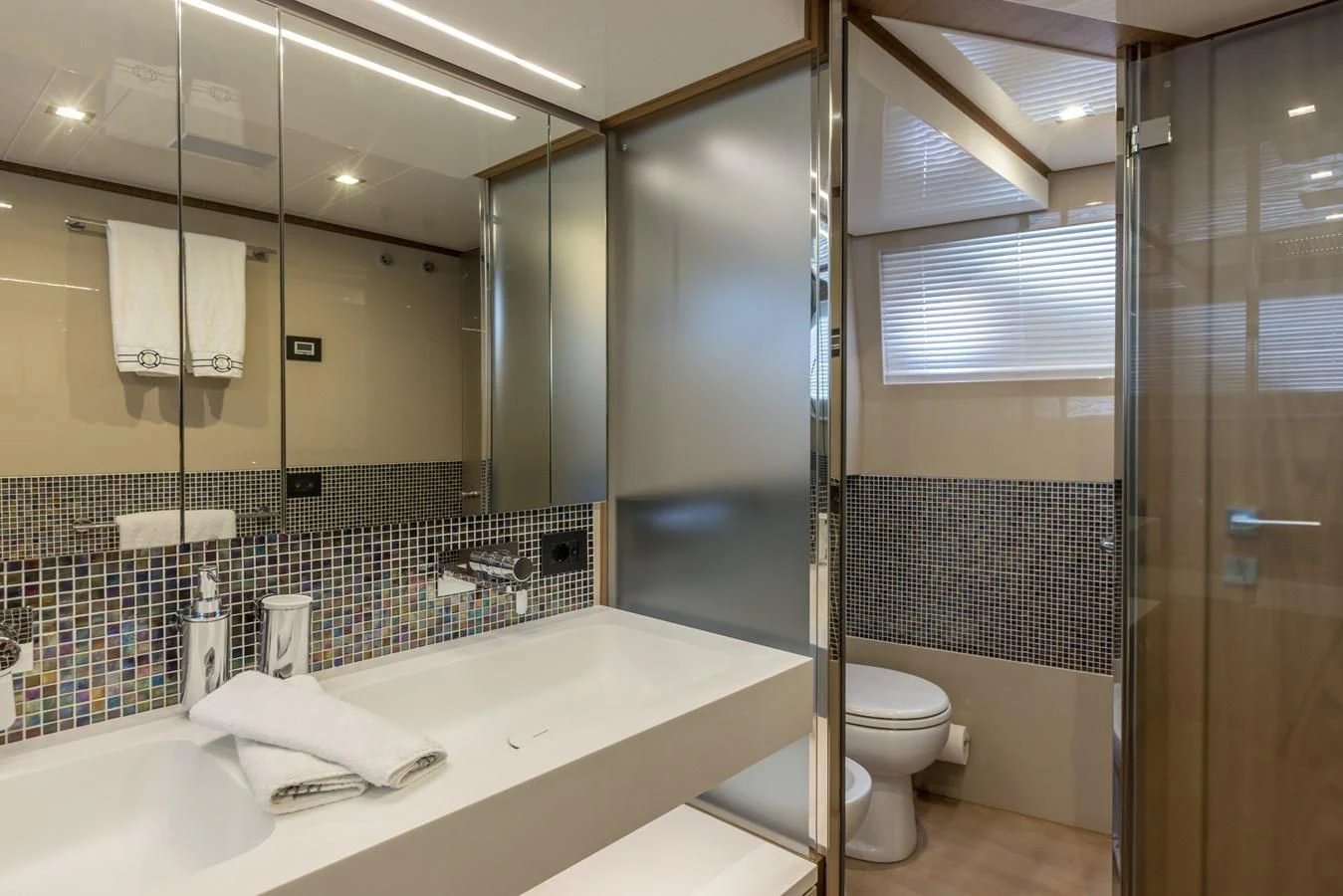 a bathroom with a large bathtub aboard KATARIINA XO Yacht for Sale