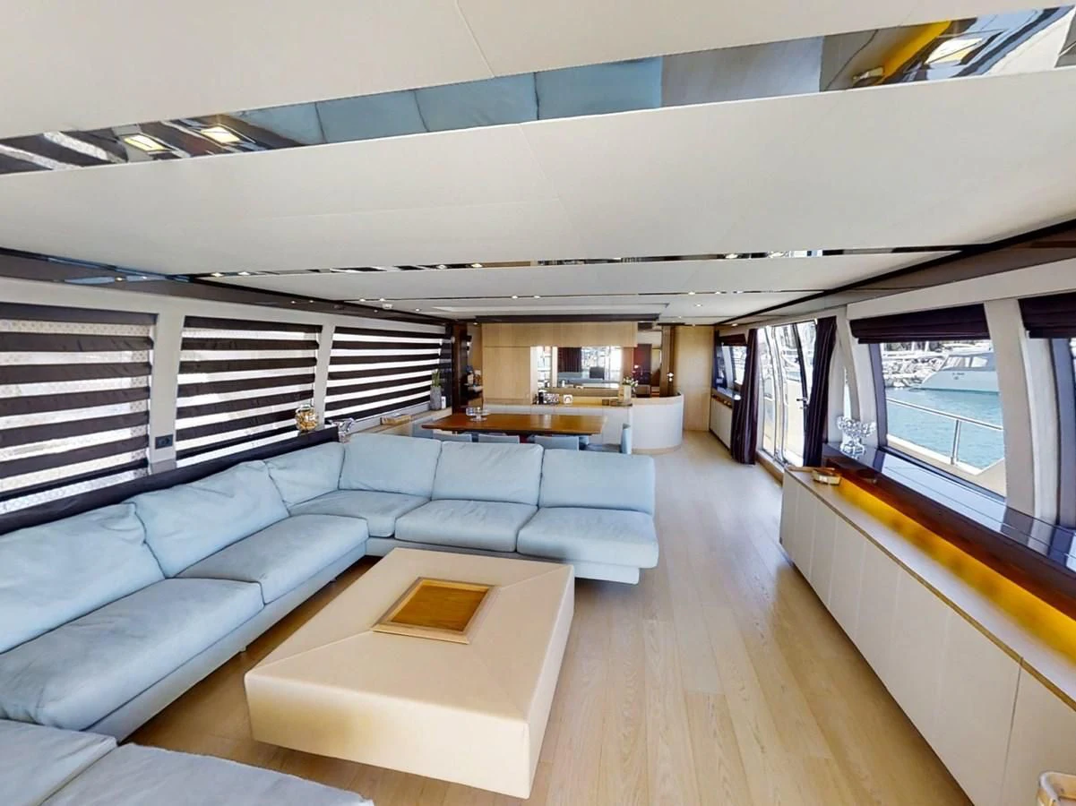 a living room with a large window aboard KATARIINA XO Yacht for Sale