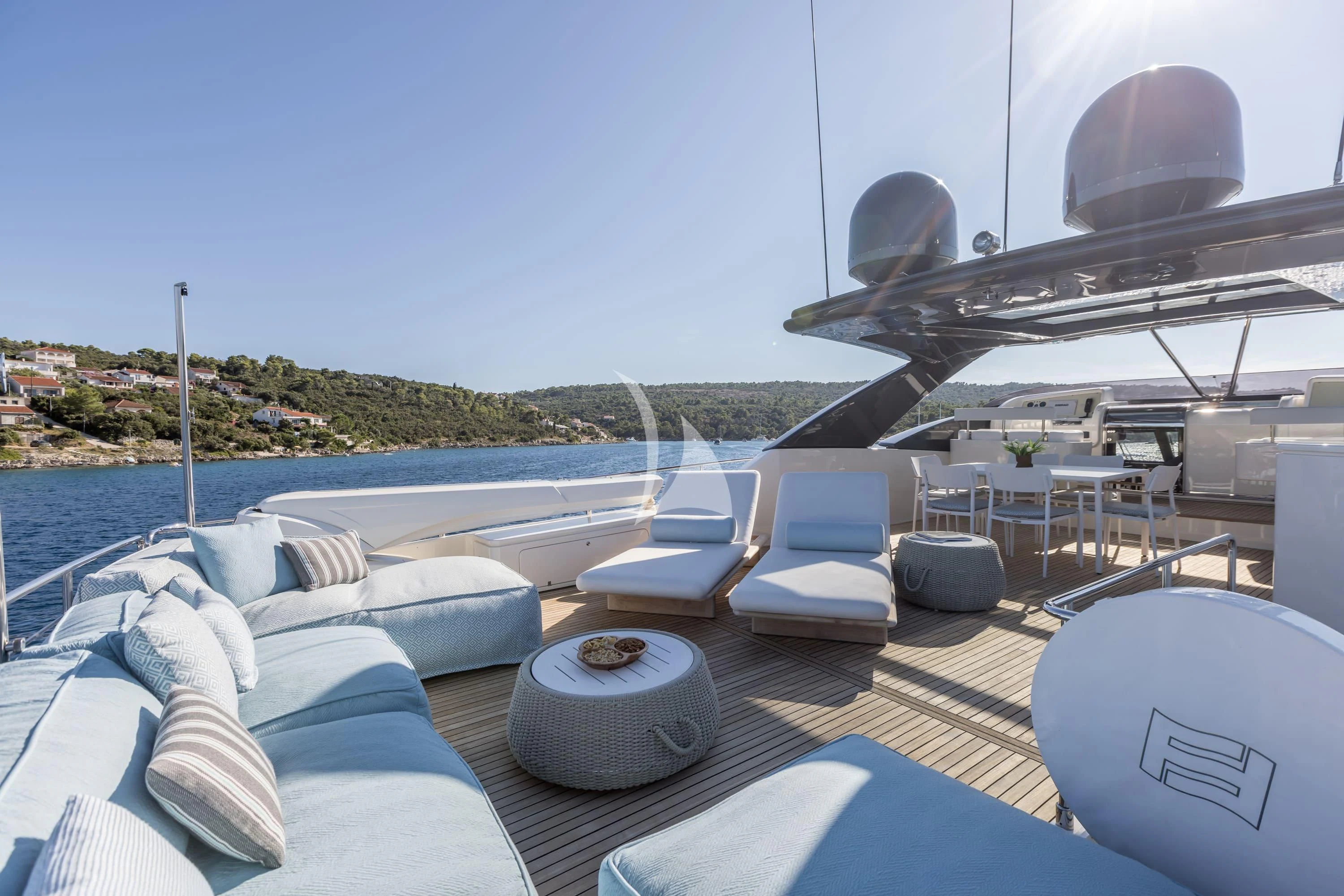 a deck with a pool and a satellite dish on it aboard KATARIINA XO Yacht for Sale