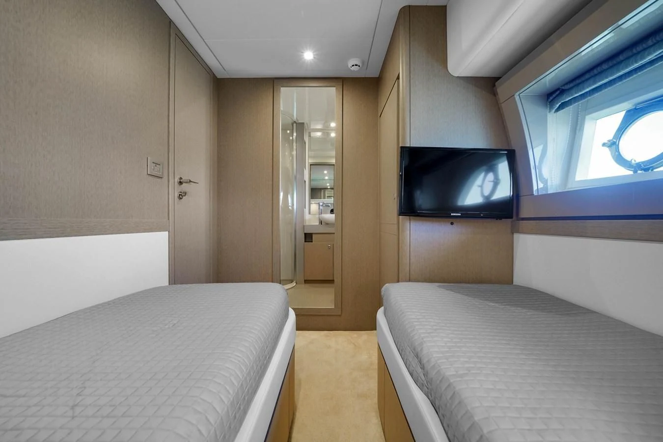 a room with a bed and a tv aboard KATARIINA XO Yacht for Sale