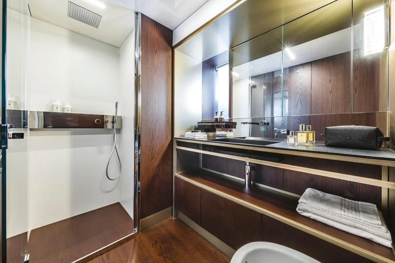 a bathroom with a countertop sink and a mirror aboard KATARIINA XO Yacht for Sale