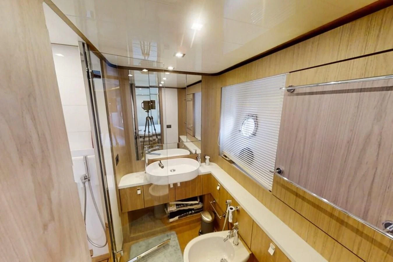 a bathroom with a sink and a mirror aboard KATARIINA XO Yacht for Sale