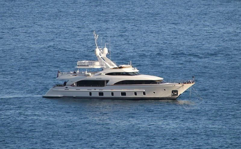 a white yacht in the water aboard SERENITY MIA Yacht for Sale