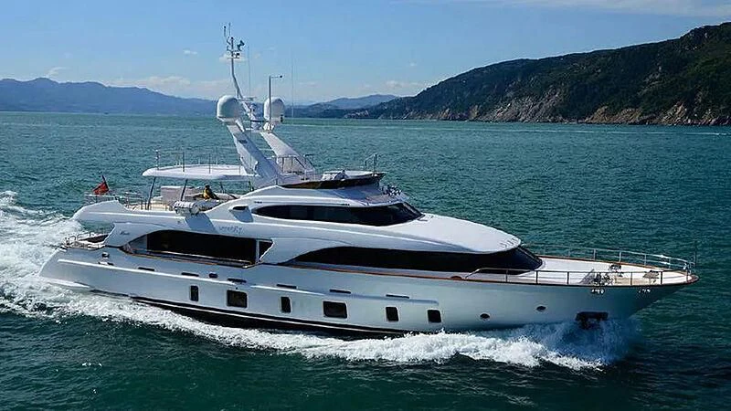 a white yacht on the water aboard SERENITY MIA Yacht for Sale