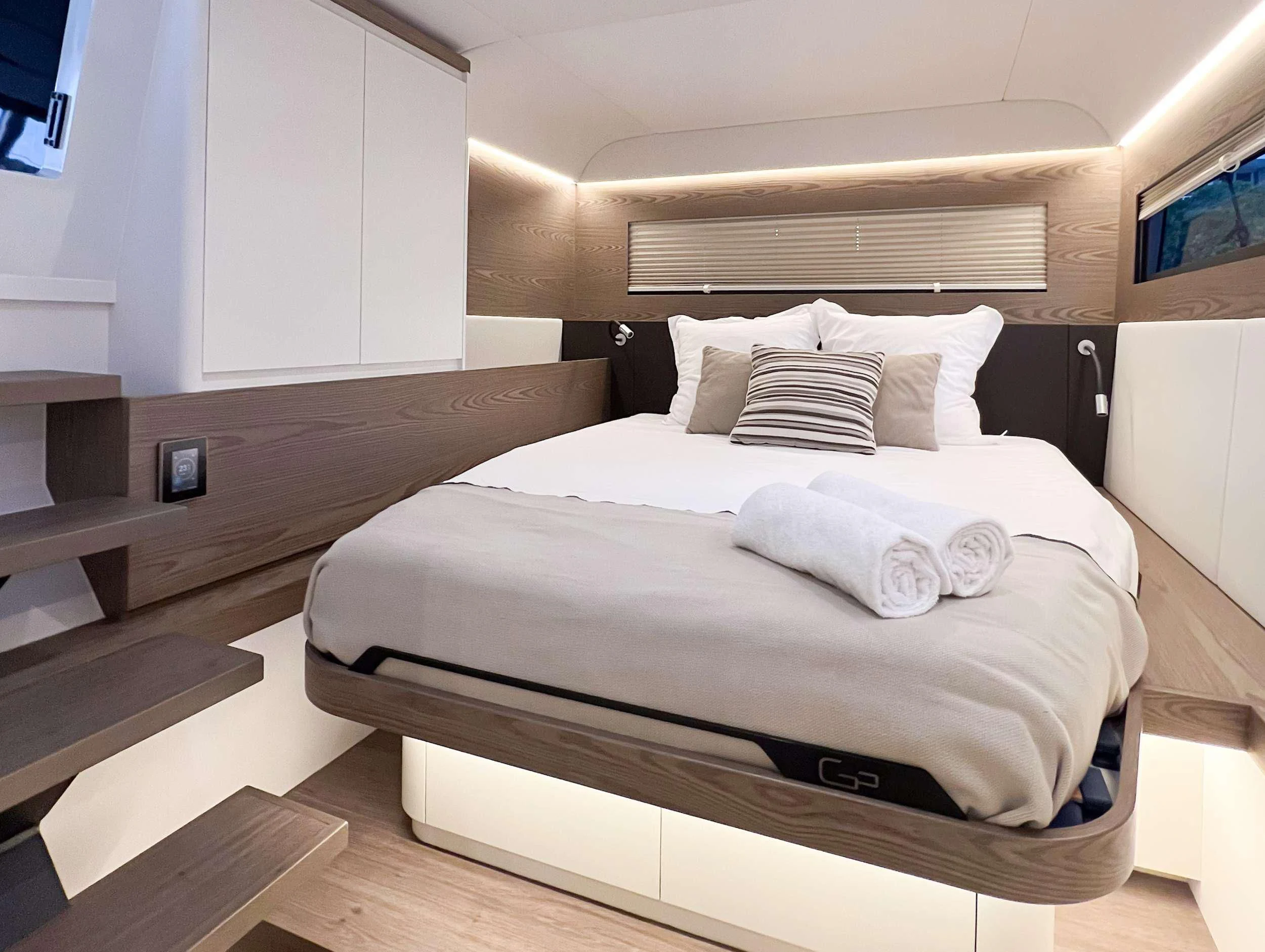a bed in a room aboard WONDERFUL Yacht for Charter