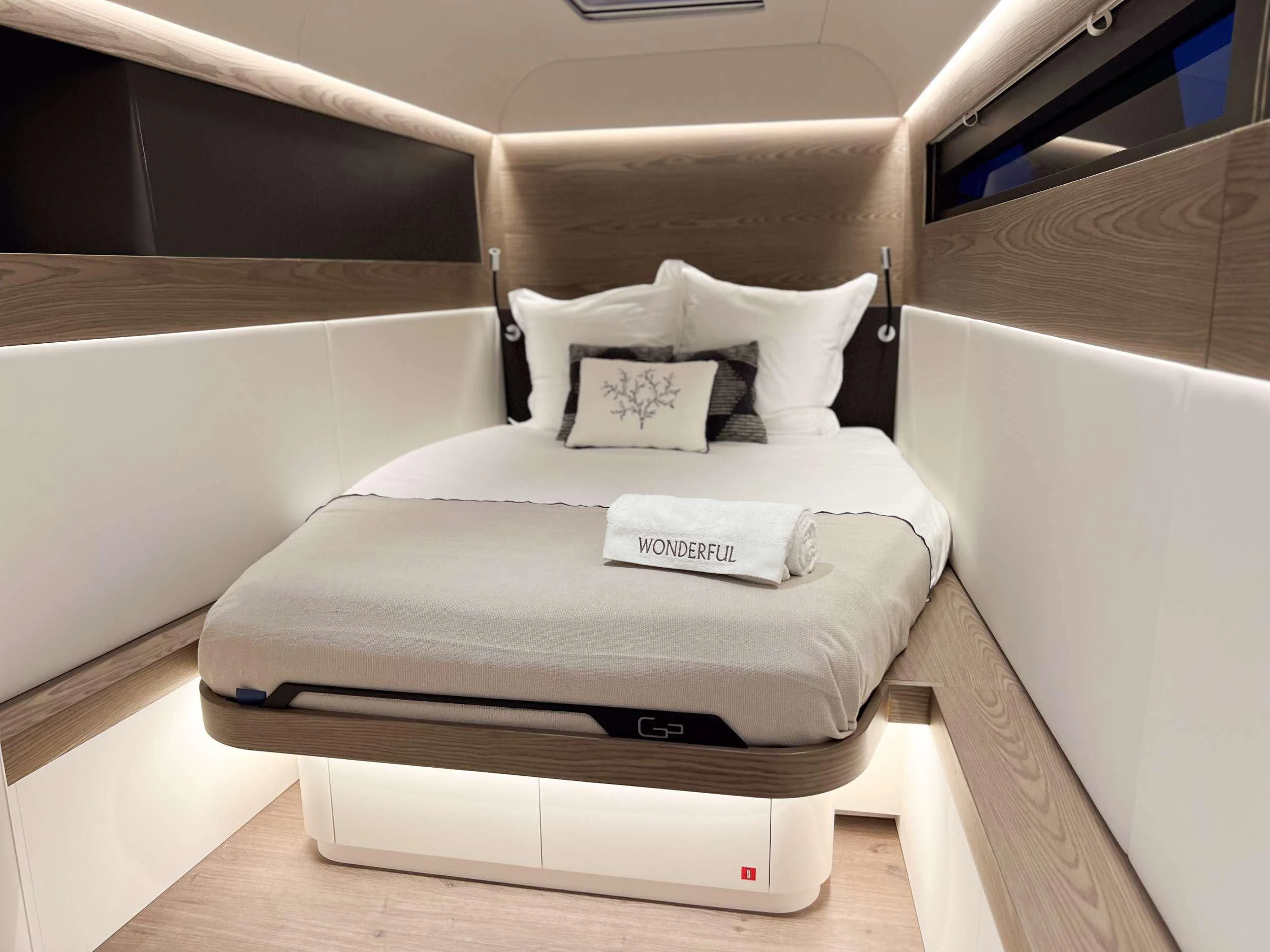 a bed in a room aboard WONDERFUL Yacht for Charter