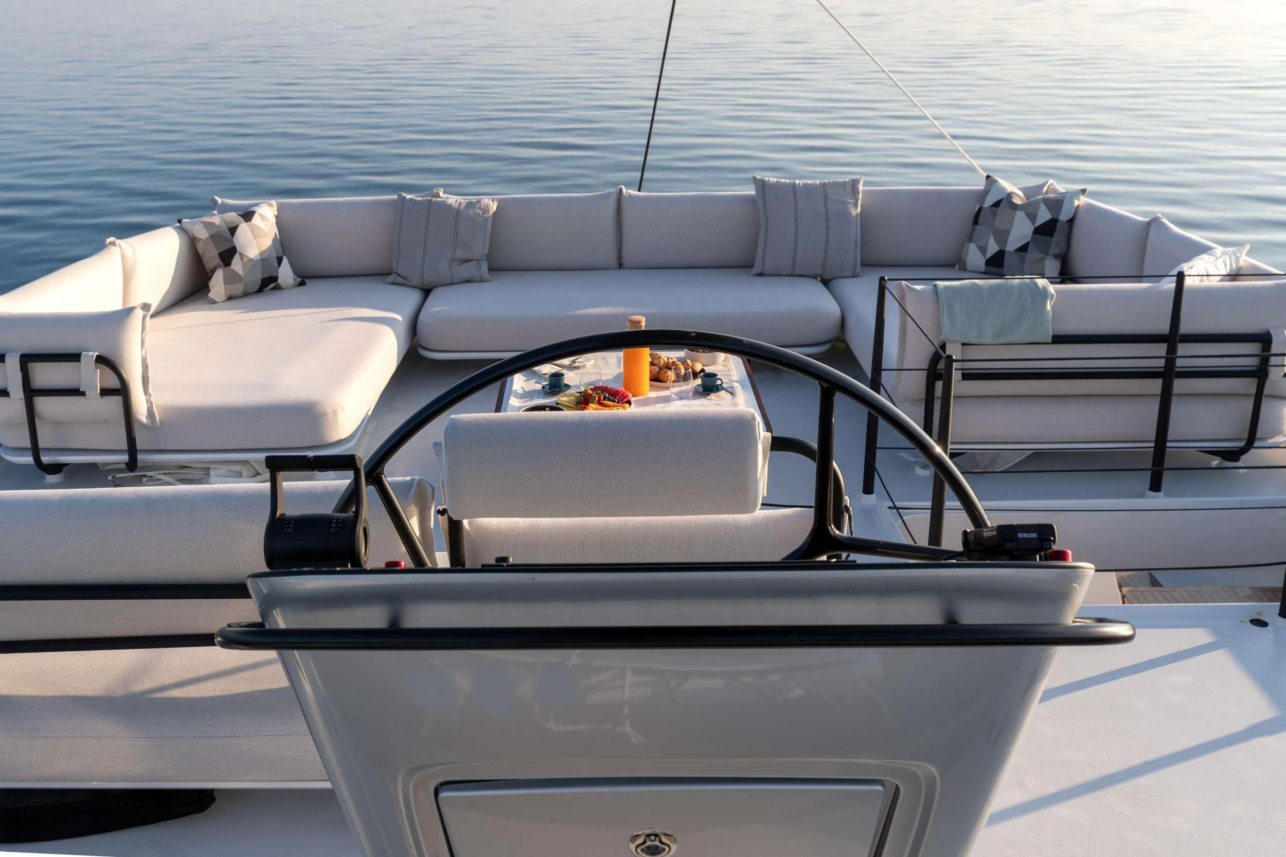a white car with a red light on the front aboard WONDERFUL Yacht for Charter