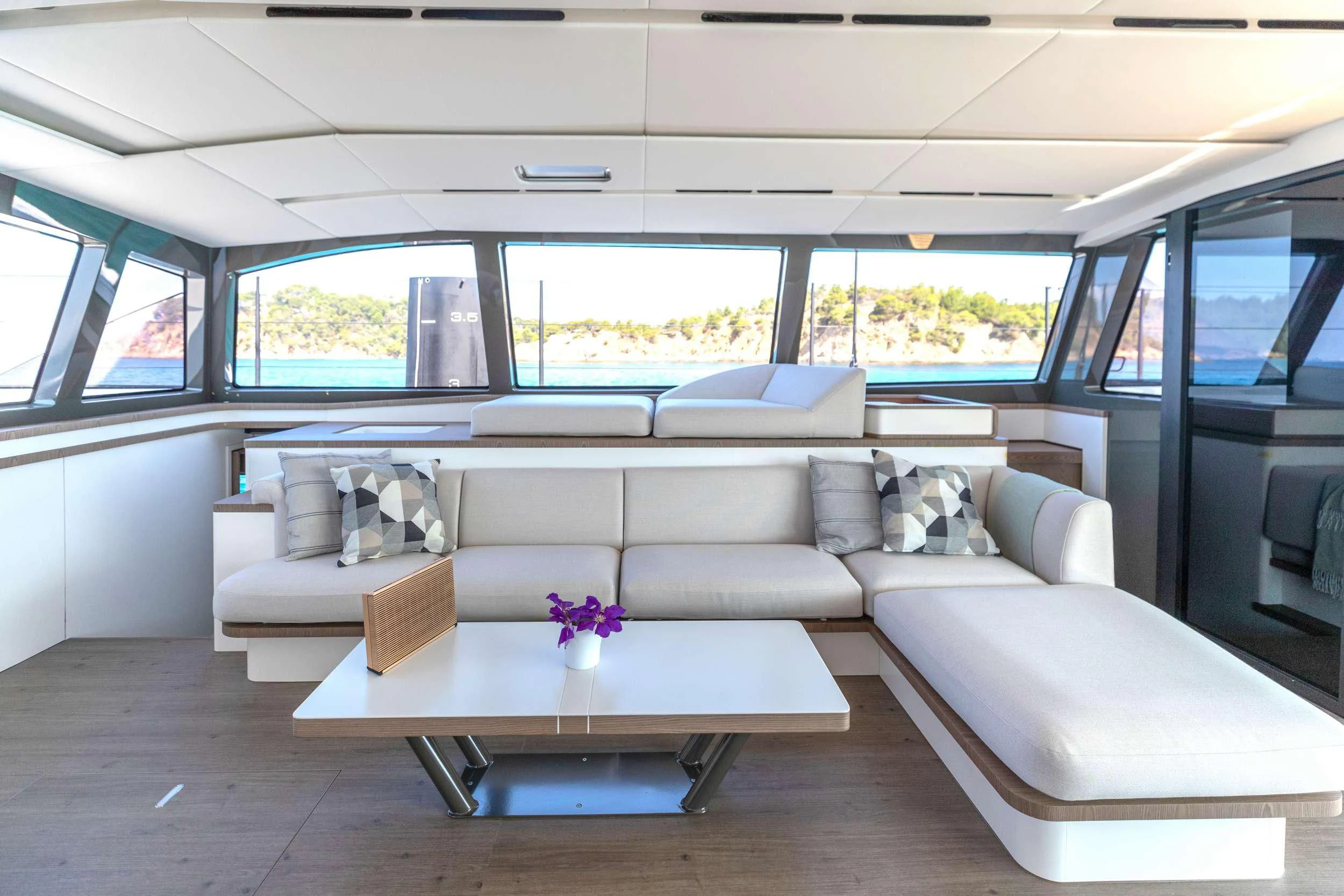 a living room with a couch and a table aboard WONDERFUL Yacht for Charter