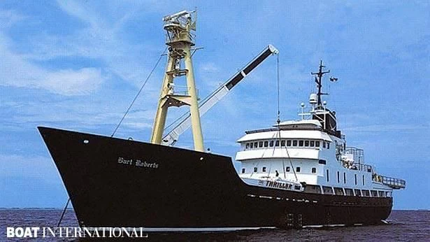 a large ship in the water aboard BART ROBERTS Yacht for Sale