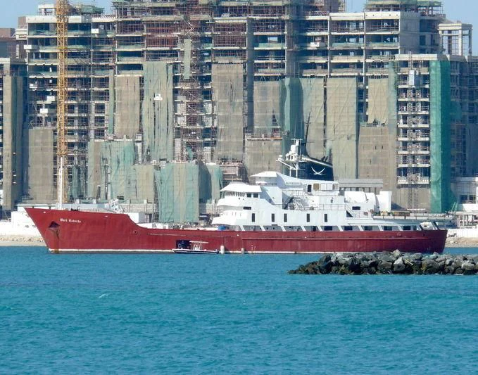 a large red and white boat aboard BART ROBERTS Yacht for Sale