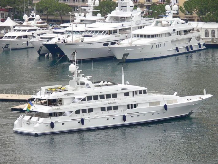 a group of white yachts in the water aboard INSPIRATION Yacht for Sale