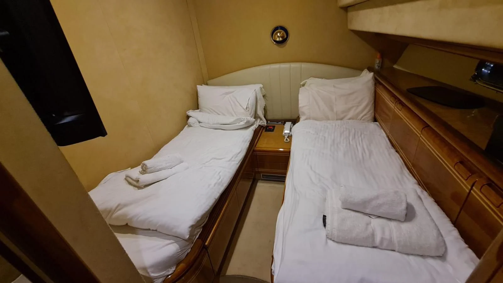 a couple of beds in a hotel room aboard 2000 FERRETTI  80 Yacht for Sale