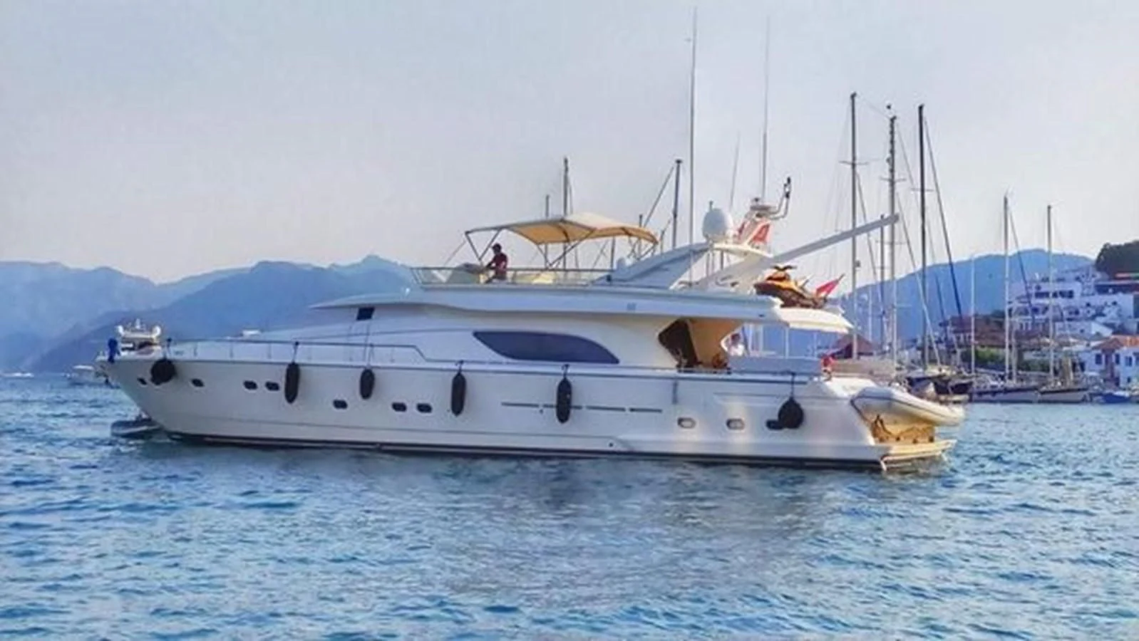 a white yacht in the water aboard 2000 FERRETTI  80 Yacht for Sale