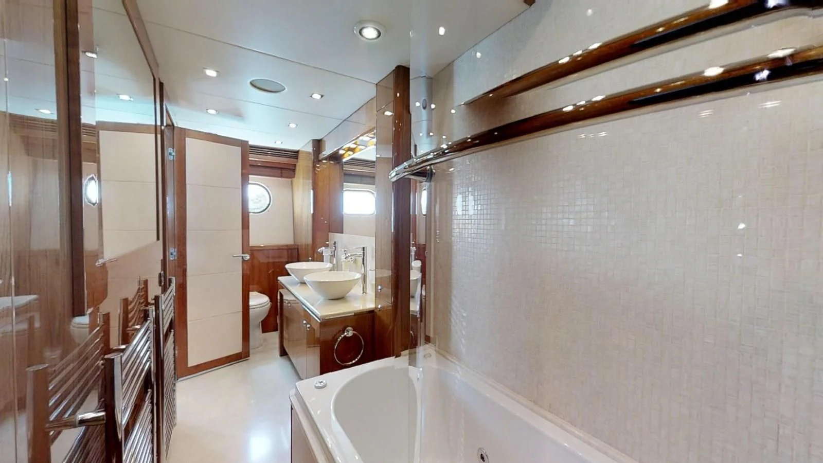a bathroom with a tub sink and sinks aboard WHITE PEARL I Yacht for Sale