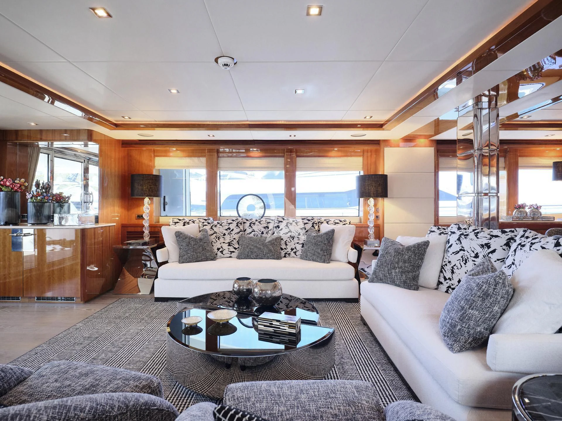 a living room with a large window aboard WHITE PEARL I Yacht for Sale