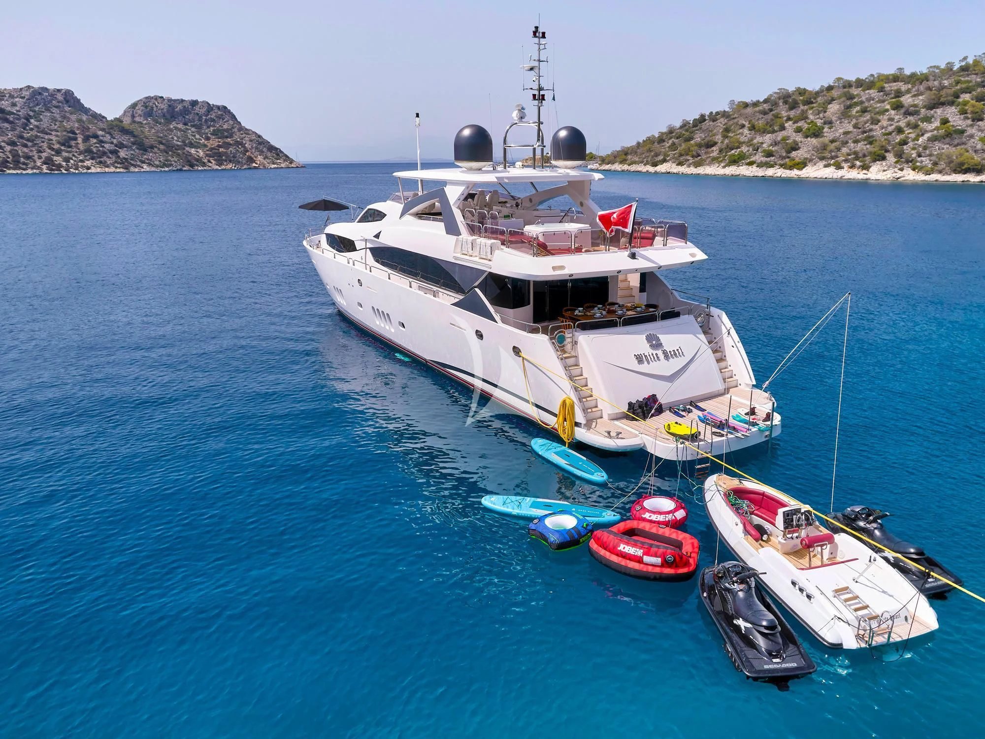 a boat in the water aboard WHITE PEARL I Yacht for Sale