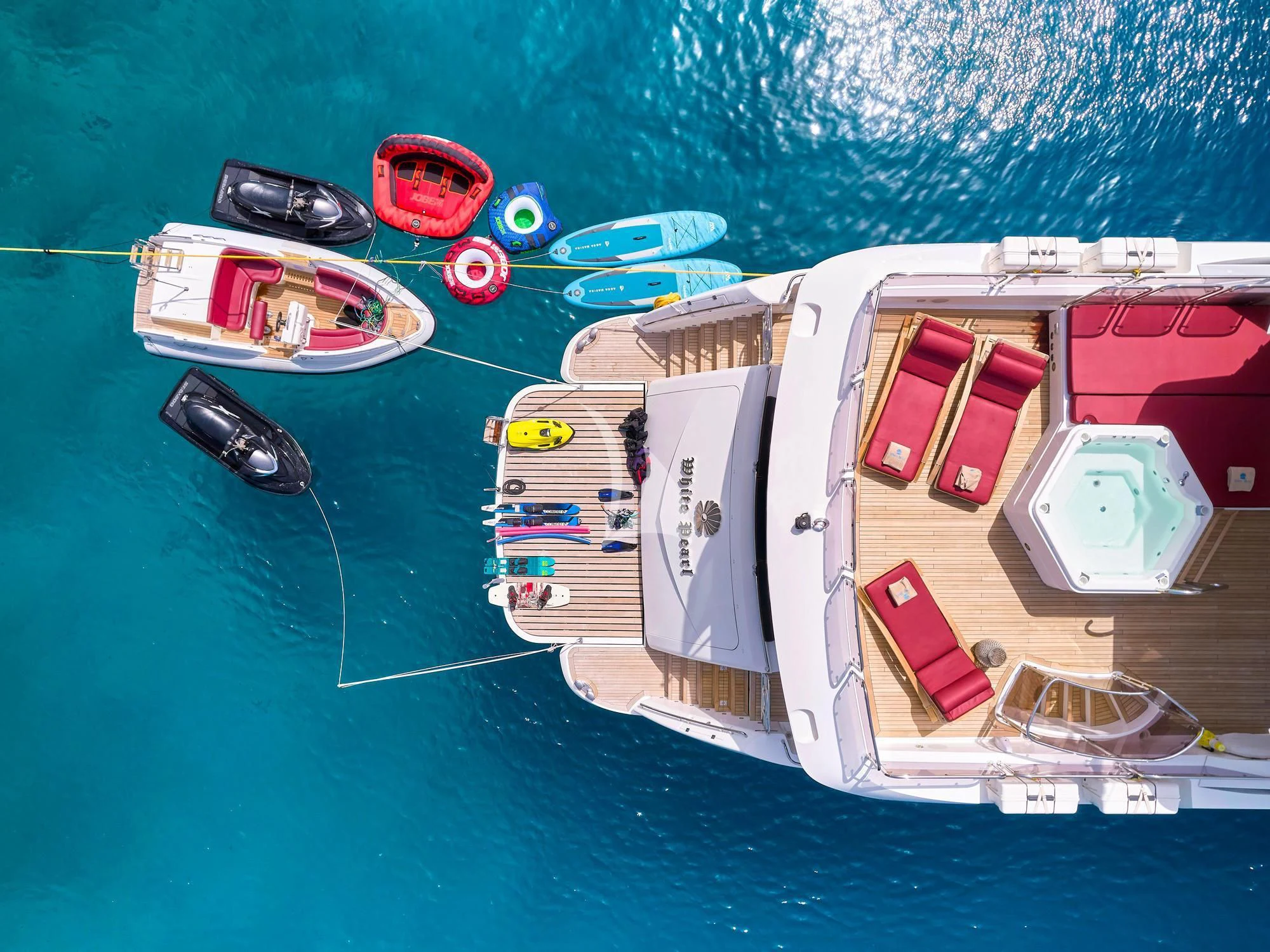 a group of boats on a body of water aboard WHITE PEARL I Yacht for Sale