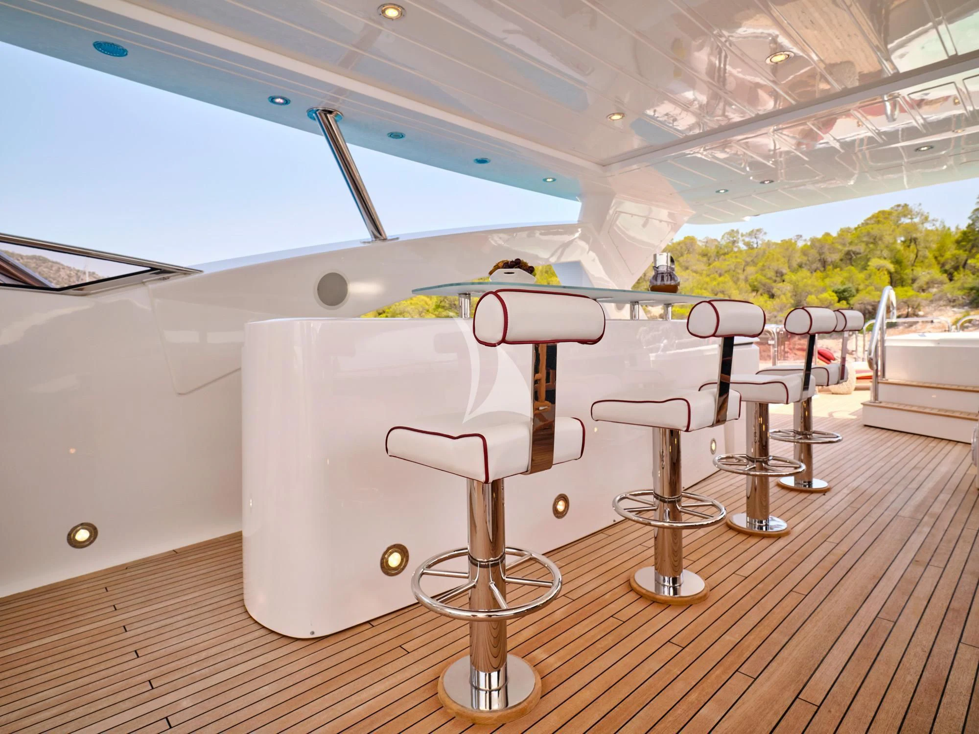 a pool table with chairs aboard WHITE PEARL I Yacht for Sale