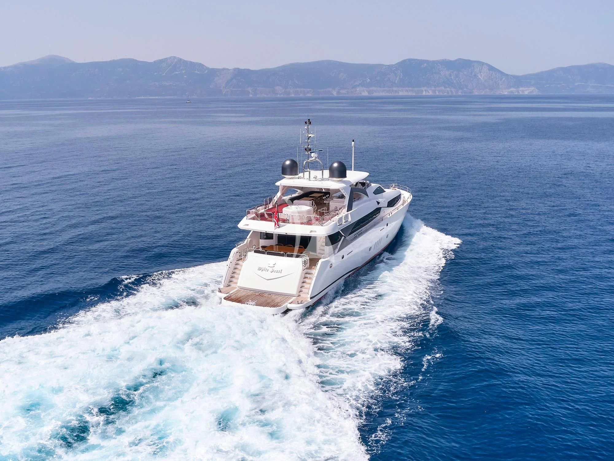 a boat on the water aboard WHITE PEARL I Yacht for Sale