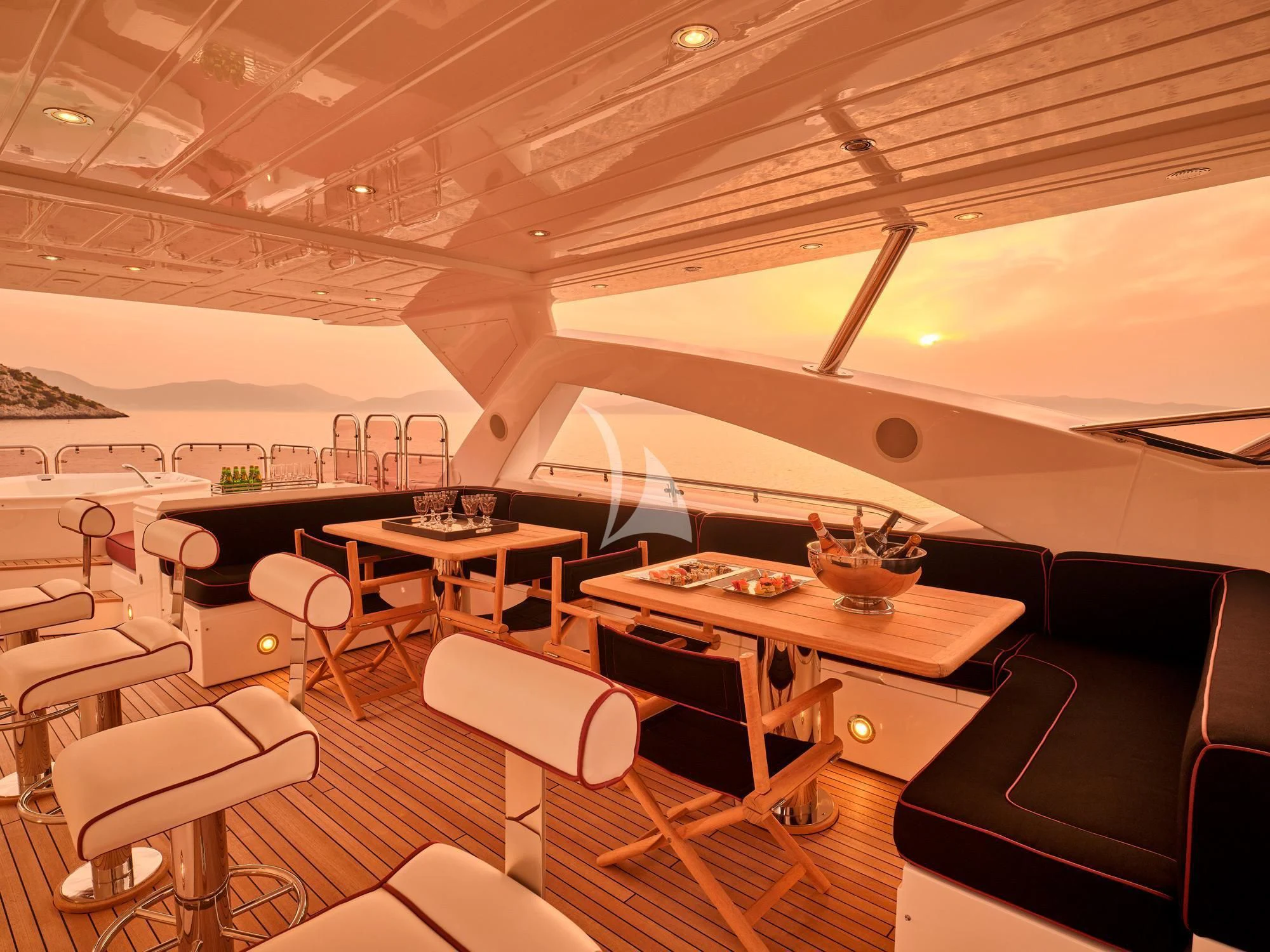 a room with tables and chairs aboard WHITE PEARL I Yacht for Sale