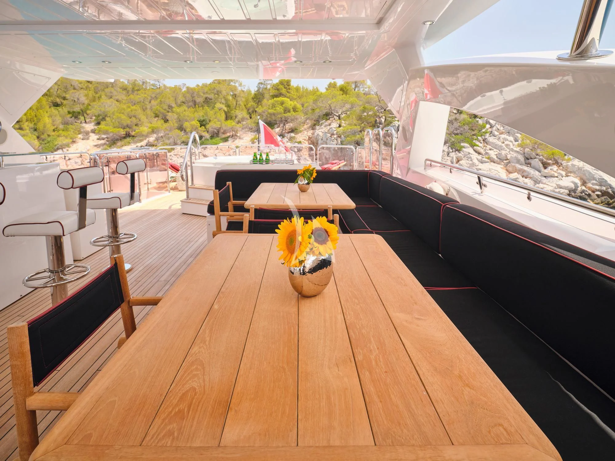 a room with a table and chairs aboard WHITE PEARL I Yacht for Sale