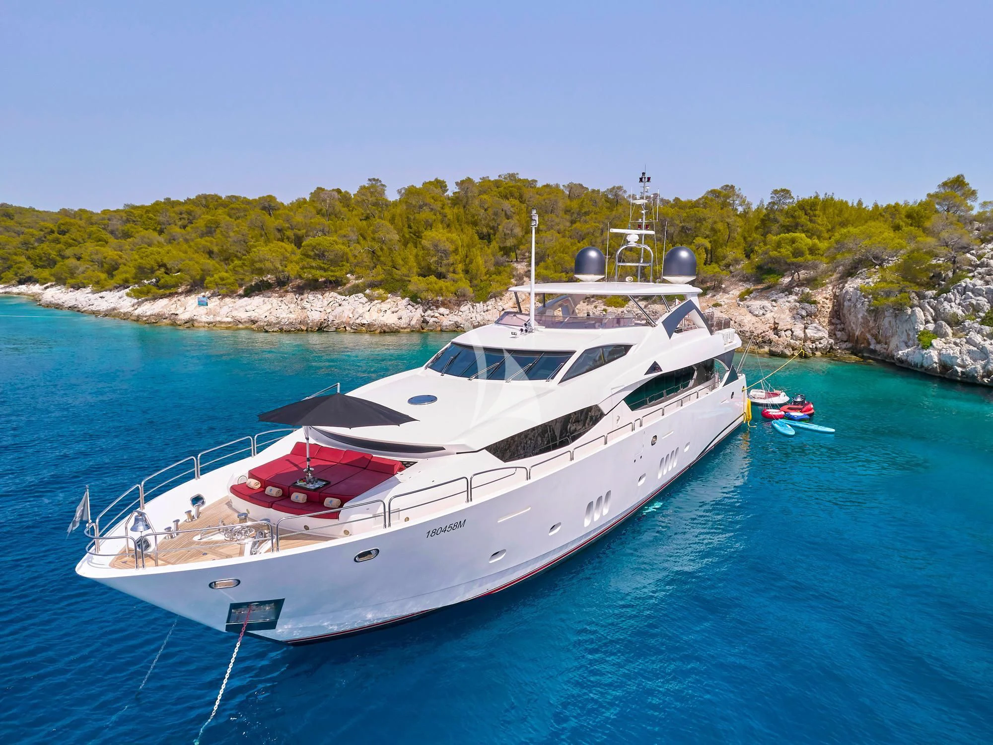 a white boat in the water aboard WHITE PEARL I Yacht for Sale
