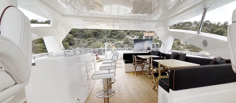 inside of a tent with tables and chairs aboard WHITE PEARL I Yacht for Sale