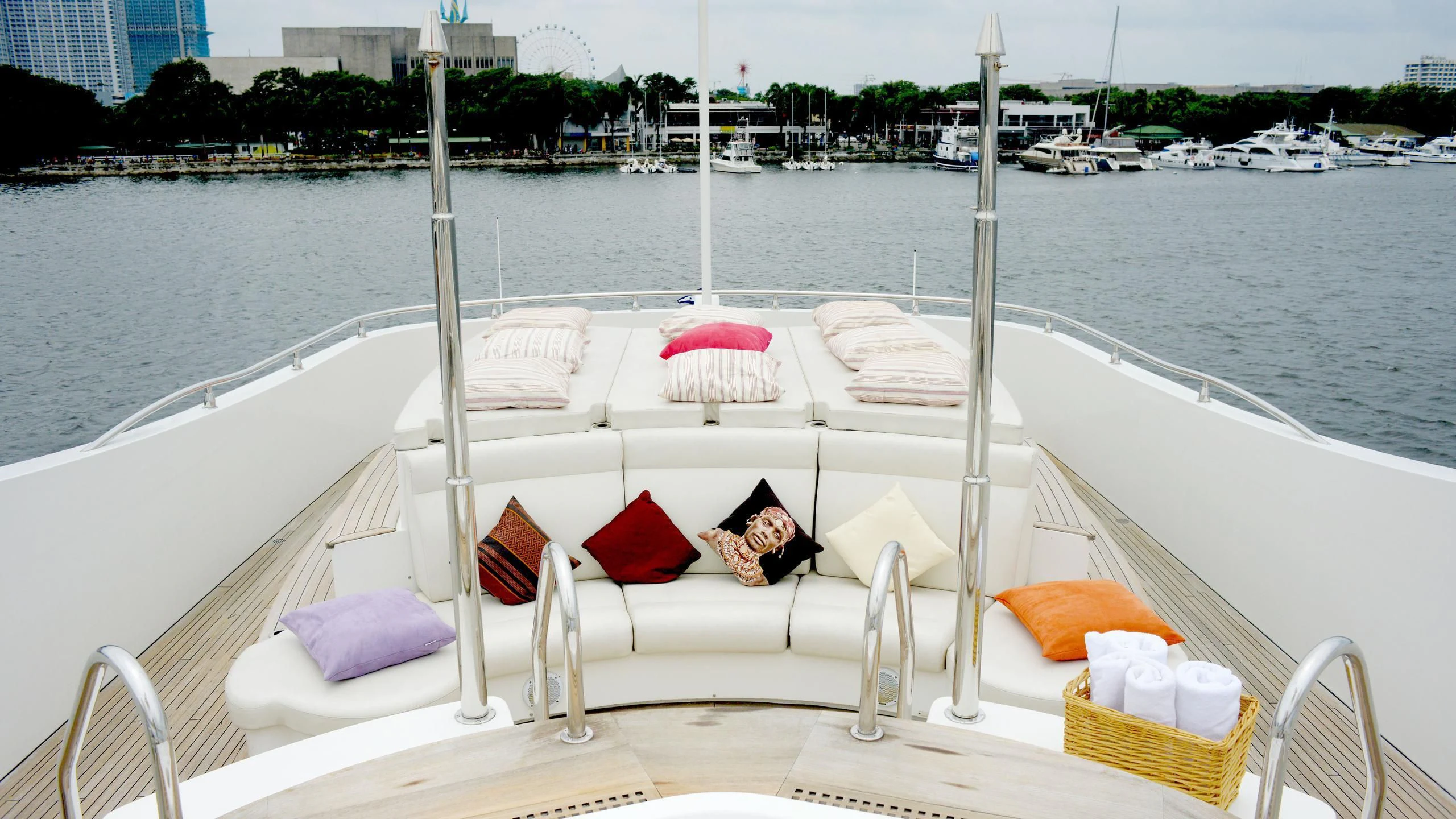 a boat with a pink umbrella on it aboard HAPPY LIFE Yacht for Sale