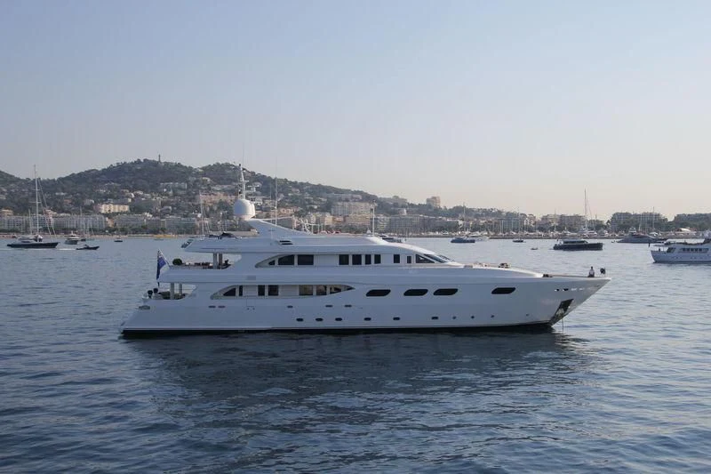 a white yacht in the water aboard HAPPY LIFE Yacht for Sale
