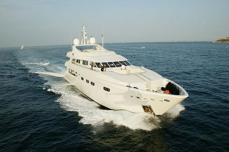 a large white boat on the water aboard HAPPY LIFE Yacht for Sale