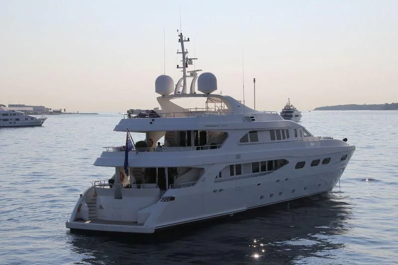 a large white boat in the water aboard HAPPY LIFE Yacht for Sale