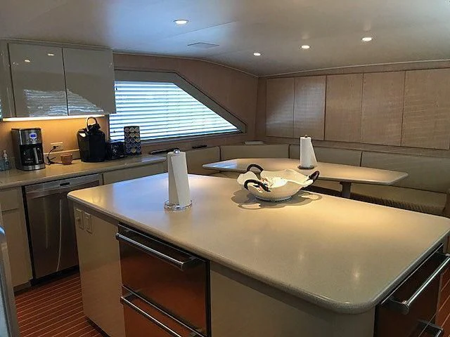 a kitchen with a large island aboard LADY GRAY Yacht for Sale