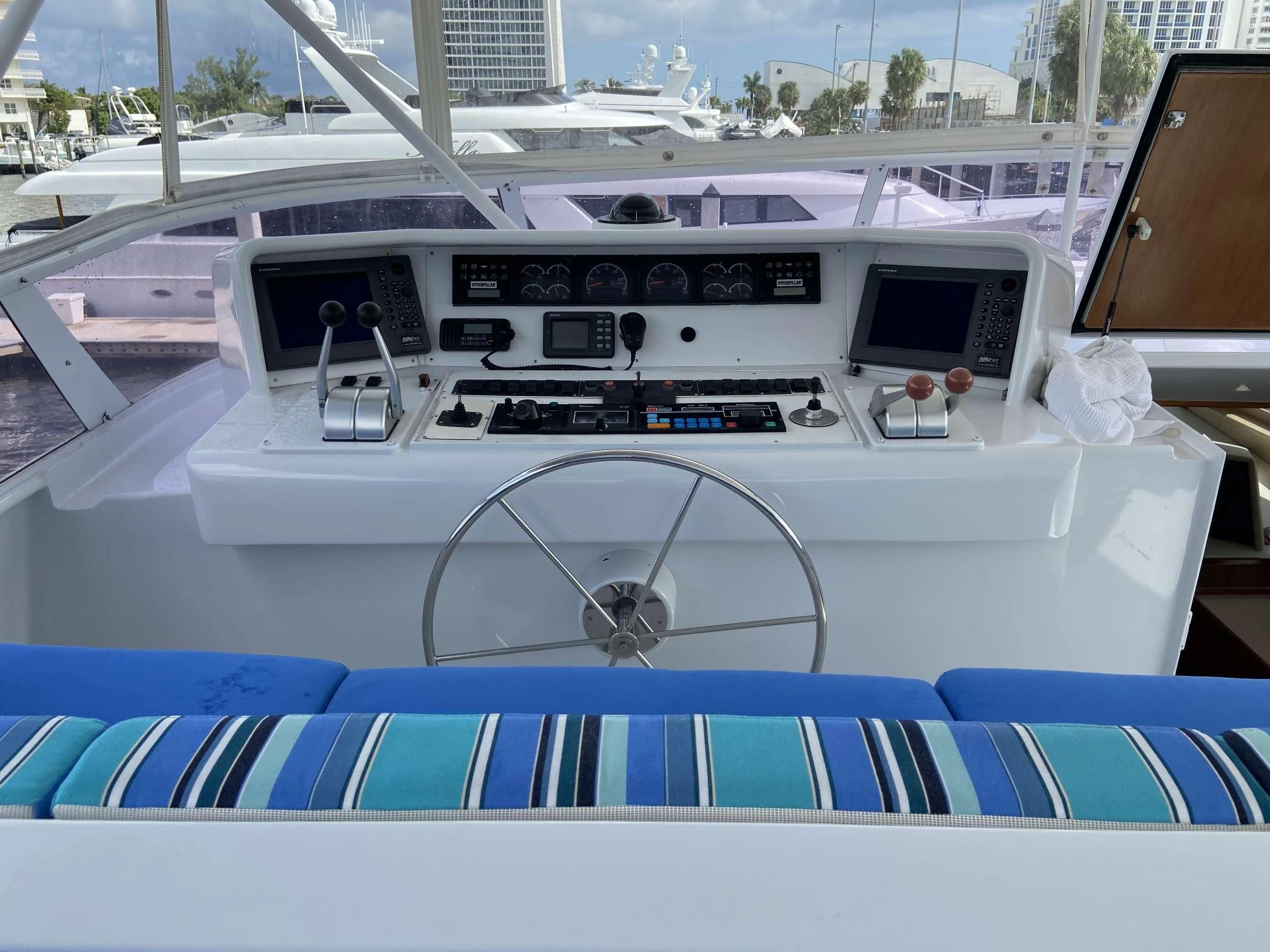 a boat with a steering wheel aboard LADY GRAY Yacht for Sale