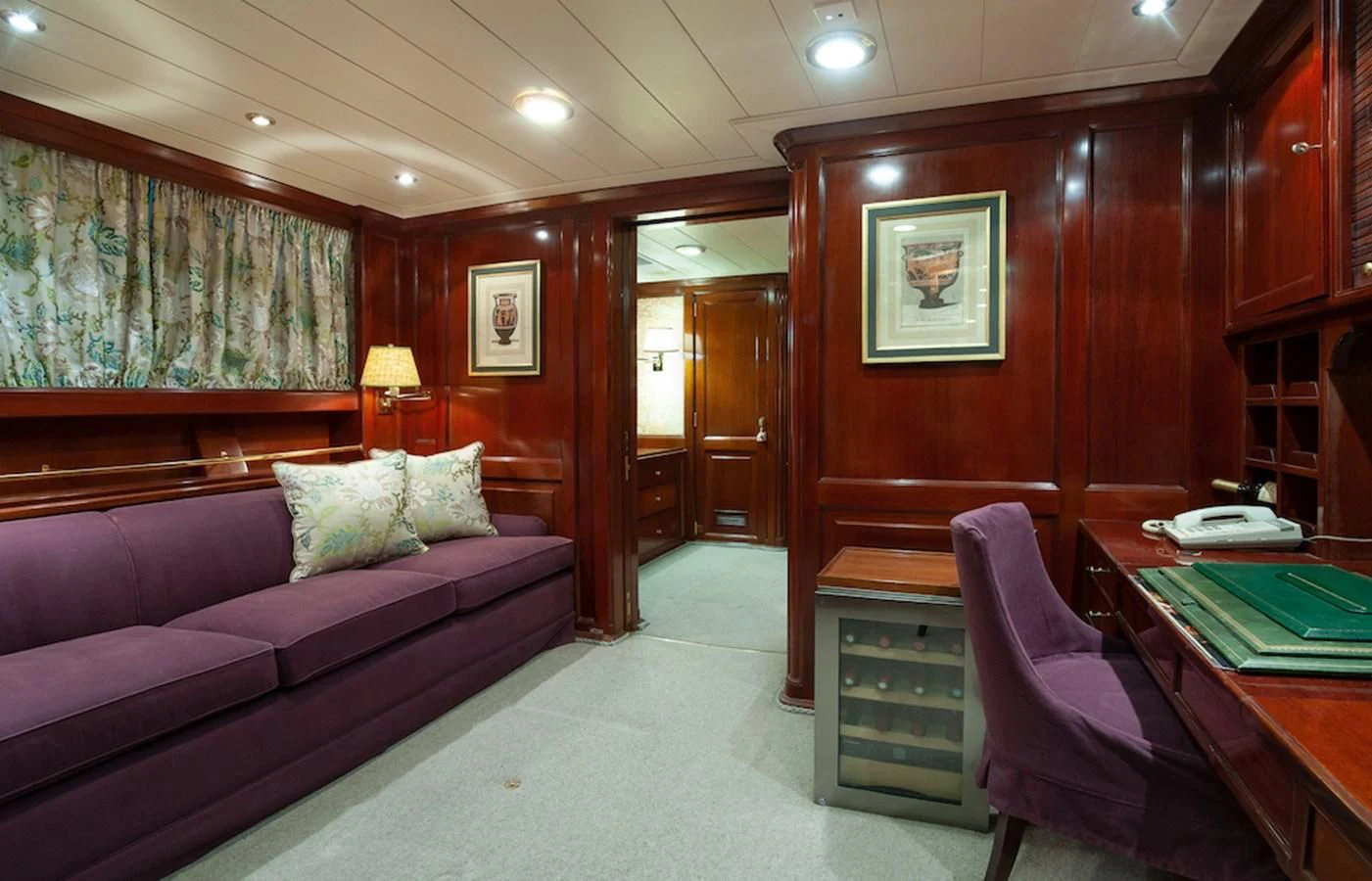 a room with a couch and a table aboard BELLE BRISE Yacht for Sale