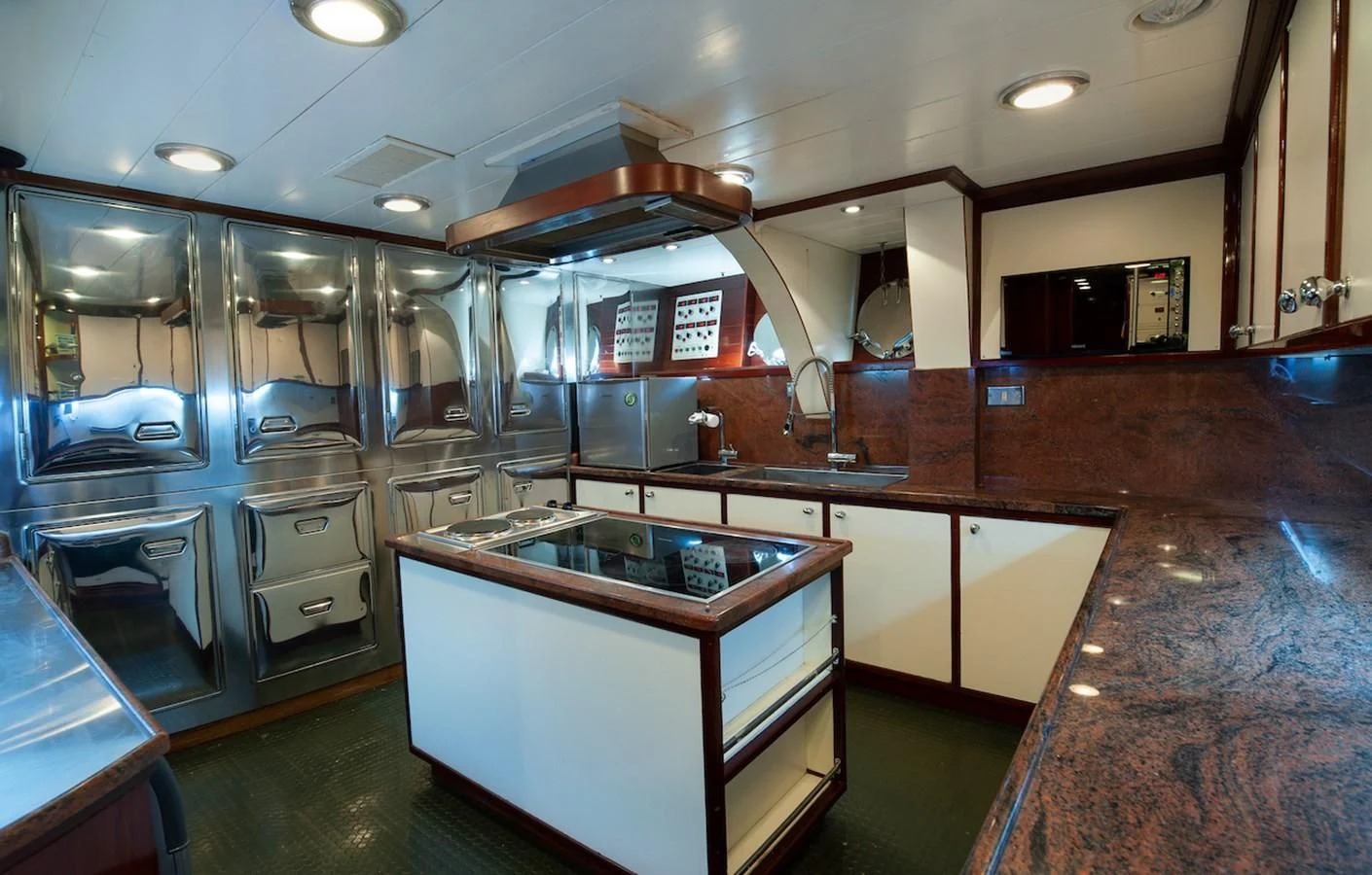 a kitchen with a large counter aboard BELLE BRISE Yacht for Sale