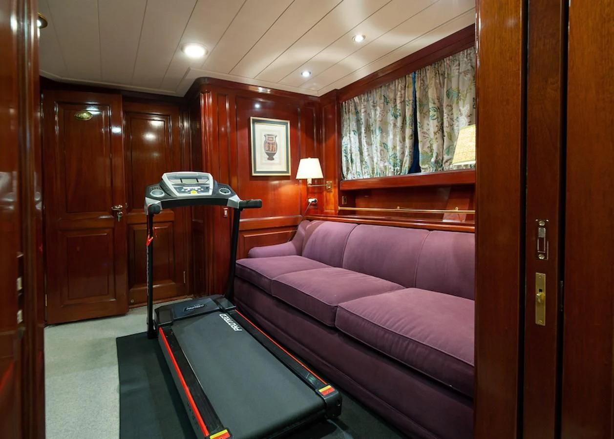 a hotel room with a bed and a phone aboard BELLE BRISE Yacht for Sale
